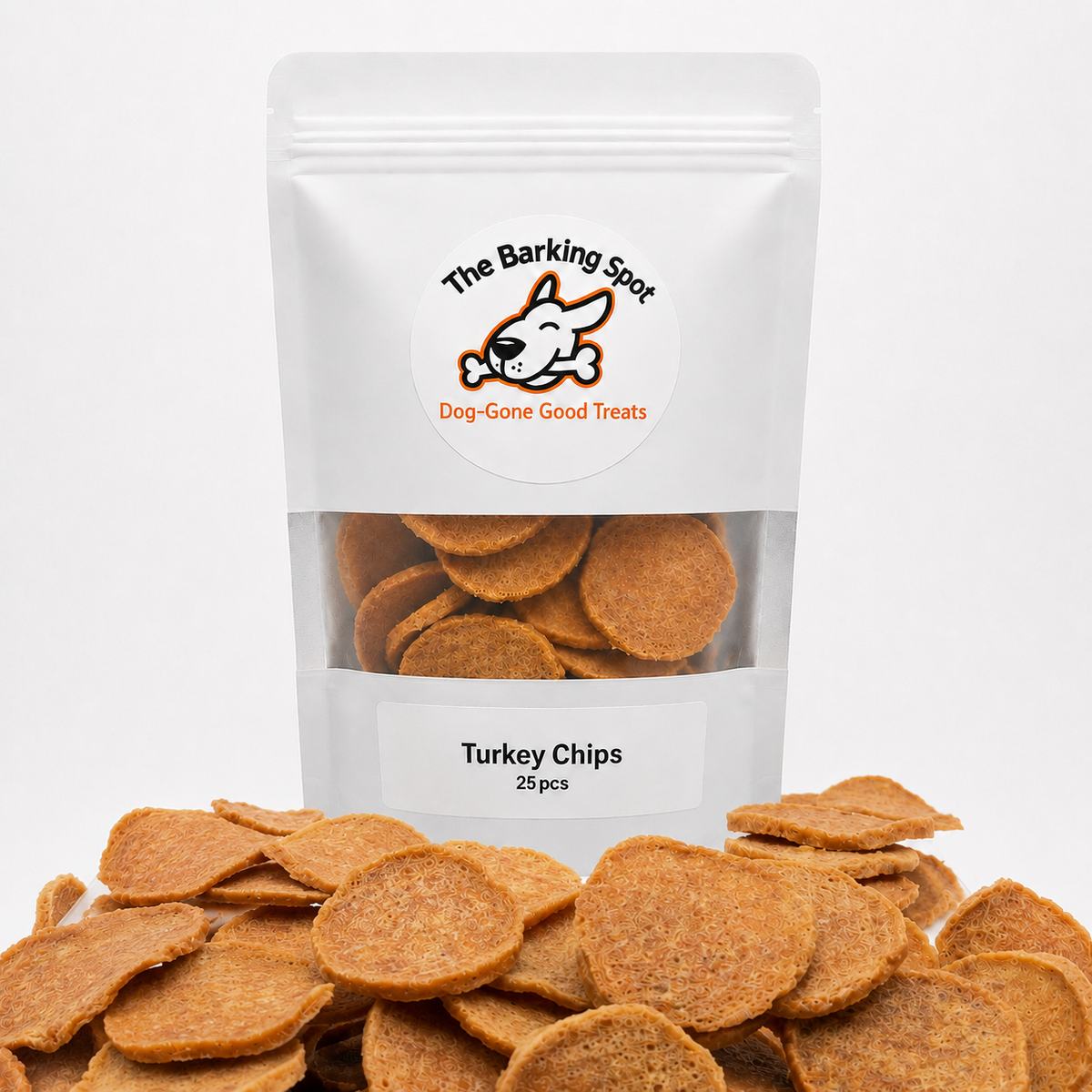 The Barking Spot Turkey Chips dog treats made from human-grade turkey breast with crispy turkey chips displayed in front of pouch
